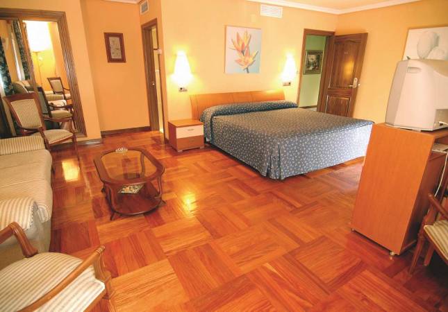 Espaciosas habitaciones en Hotel Colón Spa. Disfruta  los mejores precios de Salamanca
